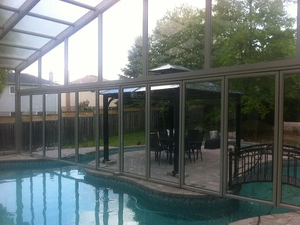 An automatic pool cover rolled over the water, the single most effective way to keep birds out