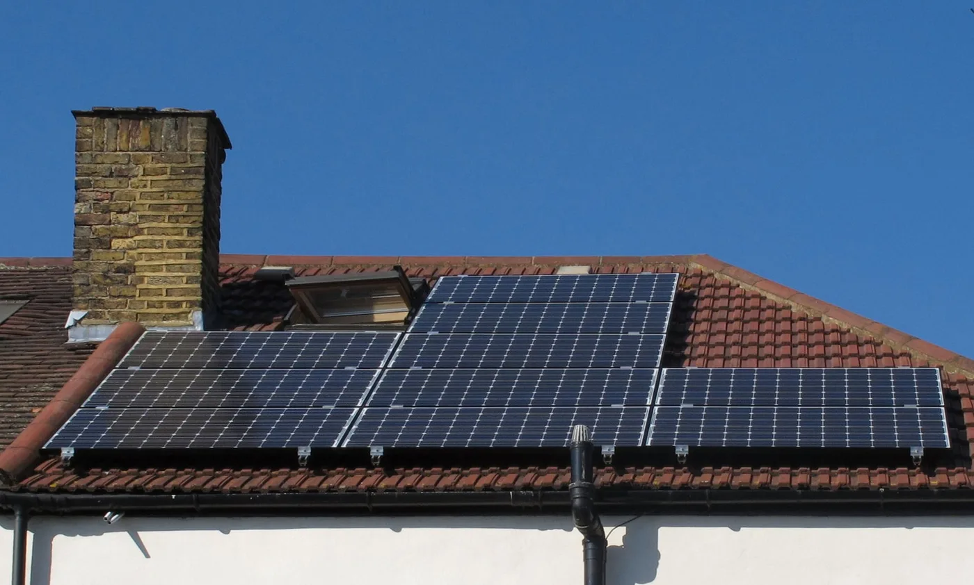 Rooftop solar panels on a tiled roof, where bird droppings shade the cells and cut output until cleaned